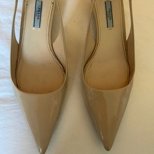 Prada beige patent low heeled pumps